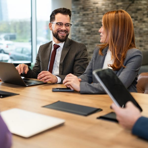 Business professionals discussing banking solutions